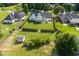 Well-maintained backyard with manicured lawn, storage shed and trimmed hedges and established trees at 3027 Biltmore Woods Dr, Buford, GA 30519
