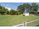 View of a spacious yard featuring a storage shed and lush greenery at 3027 Biltmore Woods Dr, Buford, GA 30519