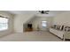 Spacious bonus room featuring a ceiling fan, daybed, and neutral tones at 3027 Biltmore Woods Dr, Buford, GA 30519