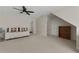 Spacious bonus room featuring a ceiling fan, daybed, and neutral tones at 3027 Biltmore Woods Dr, Buford, GA 30519