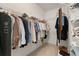 Walk-in closet with wire shelving and organized hanging clothes at 3027 Biltmore Woods Dr, Buford, GA 30519