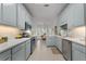 Modern kitchen with ample counter space, stainless steel appliances, and seamless access to the dining area at 3027 Biltmore Woods Dr, Buford, GA 30519