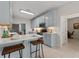 Stylish kitchen featuring updated cabinets, quartz countertops, and stainless steel appliances at 3027 Biltmore Woods Dr, Buford, GA 30519