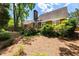 Spacious backyard area with wooden deck and tall trees, offering a private outdoor retreat at 567 N Palisades Se Cir, Marietta, GA 30067