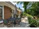 Outdoor deck featuring a dining table, grill, and a view of the landscaped backyard, perfect for outdoor entertainment at 567 N Palisades Se Cir, Marietta, GA 30067