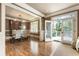 Dining room boasts hardwood floors, French doors, and bright light at 567 N Palisades Se Cir, Marietta, GA 30067