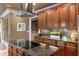 Gourmet kitchen featuring a large island, granite countertops, and stainless steel appliances at 567 N Palisades Se Cir, Marietta, GA 30067