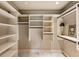 Spacious walk-in closet with custom shelving and ample storage space at 567 N Palisades Se Cir, Marietta, GA 30067