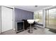 A cozy bar area featuring stylish seating, a wine cooler, and easy access to the outdoors, perfect for entertaining at 1343 Renee Dr, Decatur, GA 30035
