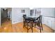 Bright kitchen with hardwood floors, open view to breakfast nook and stainless appliances at 1343 Renee Dr, Decatur, GA 30035
