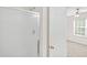 View from a bathroom with a shower, overlooking the bedroom at 5529 Festival Ave, Fairburn, GA 30213