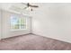 Bedroom with a tray ceiling, recessed lighting, and one window at 5529 Festival Ave, Fairburn, GA 30213