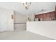 Living room space with an open floorplan to the kitchen at 5529 Festival Ave, Fairburn, GA 30213