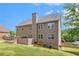 Exterior view of the house and backyard at 6086 Willowpond Ct, Douglasville, GA 30135