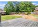 Expansive backyard with a patio and a grilling space at 6086 Willowpond Ct, Douglasville, GA 30135