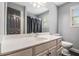 Bathroom featuring a white vanity with drawers and a toilet at 6086 Willowpond Ct, Douglasville, GA 30135