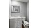Bathroom featuring a vanity, mirror, and toilet at 856 Bridgewater Sw St, Atlanta, GA 30310