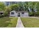 Charming home with a well-manicured lawn and inviting front entrance at 856 Bridgewater Sw St, Atlanta, GA 30310