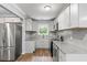 Modern kitchen featuring stainless steel appliances and granite countertops at 856 Bridgewater Sw St, Atlanta, GA 30310