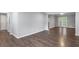 Spacious living room with hardwood floors and access to the back patio at 856 Bridgewater Sw St, Atlanta, GA 30310