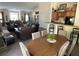 Spacious clubhouse with open floor plan, kitchen, dining area, and comfortable seating at 125 Villa Park Cir, Stone Mountain, GA 30087