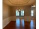 Elegant dining area featuring hardwood floors and recessed lighting, with ample natural light at 125 Villa Park Cir, Stone Mountain, GA 30087