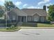 Charming brick building with manicured lawn, American flag, and ample parking at 125 Villa Park Cir, Stone Mountain, GA 30087