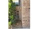 Close-up of a brick wall feature with greenery at 125 Villa Park Cir, Stone Mountain, GA 30087
