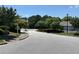 Street view of a well-maintained street with lush landscaping and homes at 125 Villa Park Cir, Stone Mountain, GA 30087