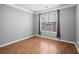 Bedroom showcasing hardwood floors and window views at 400 17Th Nw St # 1253, Atlanta, GA 30318