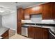 Stylish kitchen featuring dark cabinetry, stainless steel appliances, and ample counter space at 400 17Th Nw St # 1253, Atlanta, GA 30318