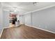 Modern living room that flows into the kitchen, featuring hardwood floors and abundant natural light at 400 17Th Nw St # 1253, Atlanta, GA 30318