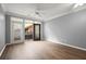 Living room area showcasing balcony access and ceiling fan at 400 17Th Nw St # 1253, Atlanta, GA 30318