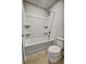 Small bathroom featuring a single vanity, a toilet, and a shower/tub combo at 297 Delta Dr, Mcdonough, GA 30252