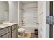 Small bathroom featuring a single vanity, a toilet, and a shower/tub combo at 297 Delta Dr, Mcdonough, GA 30252