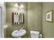 Powder room with modern fixtures and a decorative mirror at 506 Glen Ivy # 5, Marietta, GA 30062