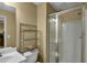 Bathroom featuring shower stall with sliding glass door, shelving unit, toilet and vanity at 506 Glen Ivy # 5, Marietta, GA 30062