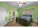 Bright bedroom with comfortable bed, ceiling fan, and natural light at 506 Glen Ivy # 5, Marietta, GA 30062