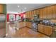 Eat-in kitchen featuring stainless steel appliances, wood cabinets, and an island at 506 Glen Ivy # 5, Marietta, GA 30062
