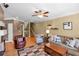Comfortable living room with hardwood floors, ceiling fan, and ample natural light at 506 Glen Ivy # 5, Marietta, GA 30062