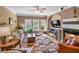Inviting living room with a fireplace, a large window, neutral paint, and hardwood flooring at 506 Glen Ivy # 5, Marietta, GA 30062