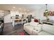 Open floor plan showing the kitchen, dining area, and living room with lots of natural light at 668 Isom Walk, Suwanee, GA 30024
