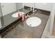 Bathroom with dual sinks, granite countertop, and ample counter space at 1000 Willow Crest Lndg, Austell, GA 30168