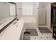 Relaxing bathroom with a large tub, separate shower, and a stylish vanity with ample counter space at 1000 Willow Crest Lndg, Austell, GA 30168