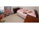 Cozy bedroom decorated with a doll house and pink ballerina themed bedding at 1000 Willow Crest Lndg, Austell, GA 30168