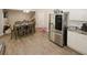 Open concept kitchen and dining area featuring modern appliances and a spacious layout at 1000 Willow Crest Lndg, Austell, GA 30168