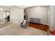 Spacious living room showcasing a chair, carpet, an archway to the front entrance and access to other rooms at 1000 Willow Crest Lndg, Austell, GA 30168