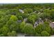 Expansive treetops offer privacy, with glimpses of a vibrant cityscape beyond the neighborhood at 1020 Austin Ne Ave, Atlanta, GA 30307