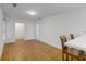 Open dining room with hardwood floors and counter seating for casual meals at 1020 Austin Ne Ave, Atlanta, GA 30307