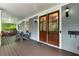 Spacious front porch with seating, wood floors, and classic details, perfect for enjoying the outdoors at 1020 Austin Ne Ave, Atlanta, GA 30307